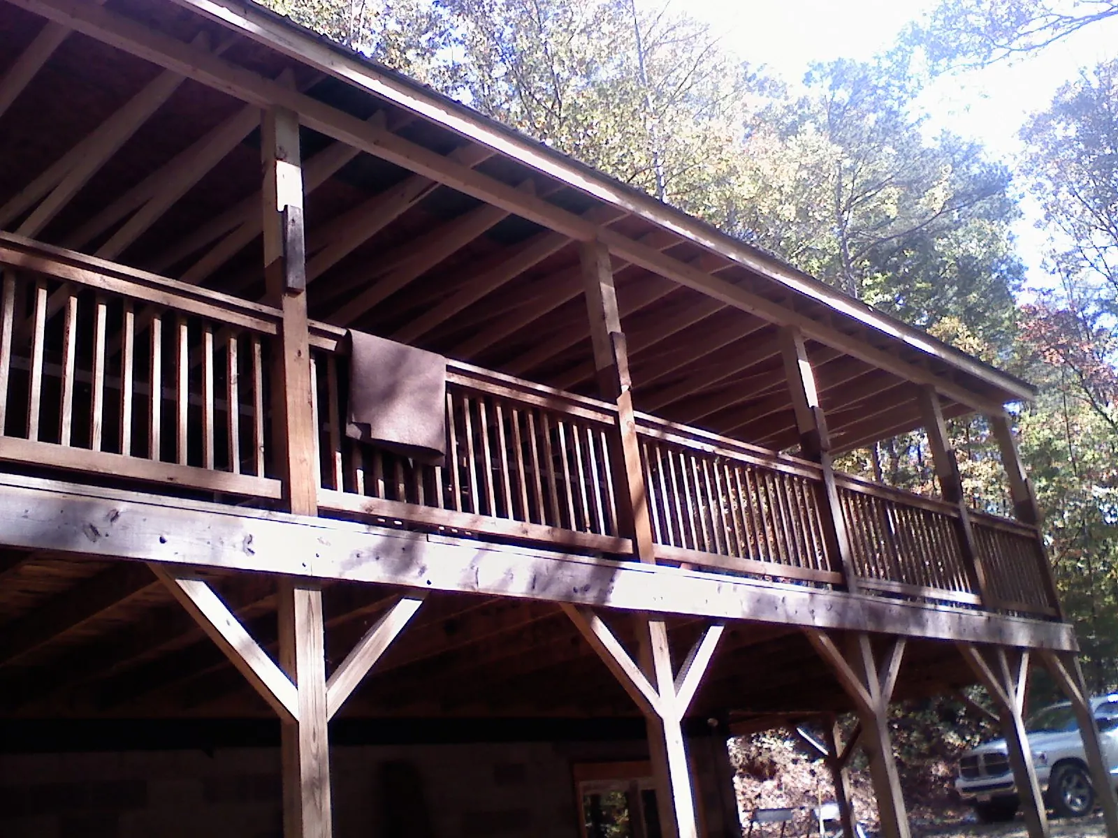 Timber framing under a new elevated porch and deck — Roof Leak Repair in Cowen by Roofing Brothers